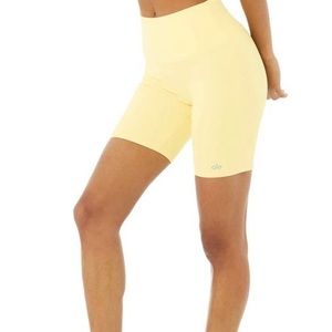 Alo Yoga yellow biker shorts